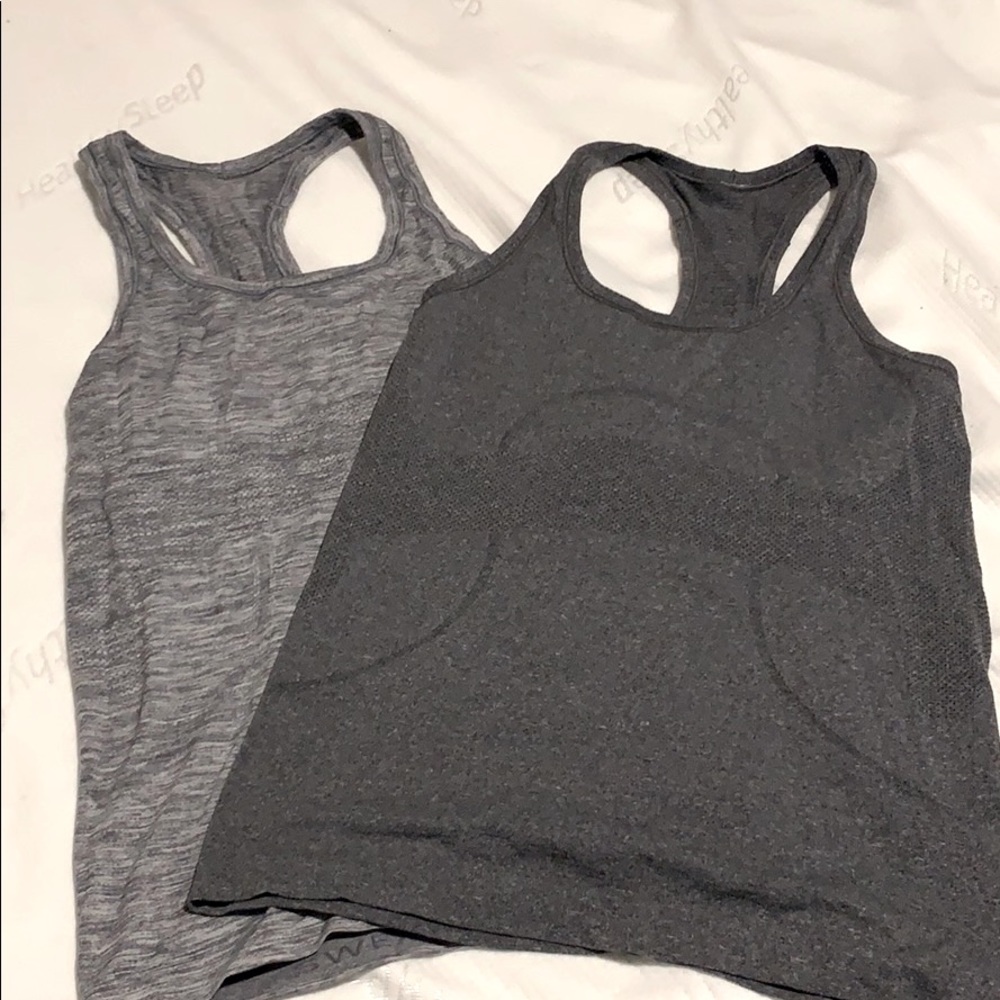 Two grey Lululemon tanks